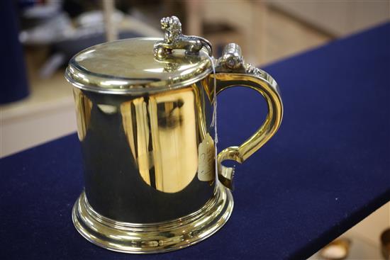 A good George V Charles II style Garrard & Co silver gilt replica tankard.